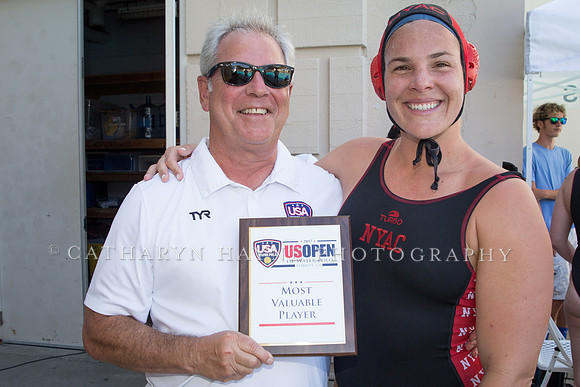 Marty Samuels presents Kami Craig with Most Valuable Player  at