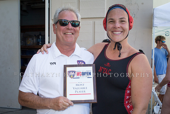 Marty Samuels presents Kami Craig with Most Valuable Player  at