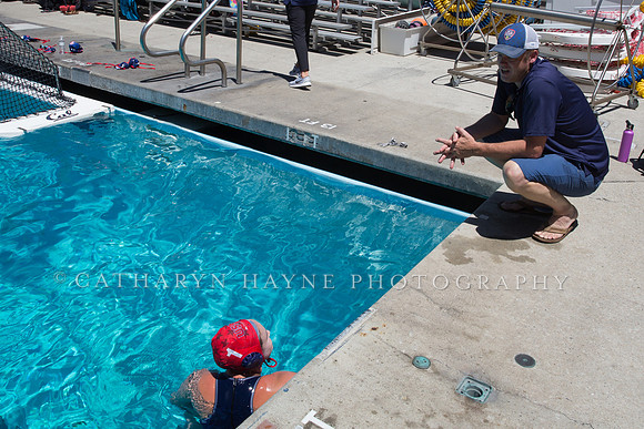 Sean Nolan speaks to a goalie during Championships at US Open Wa