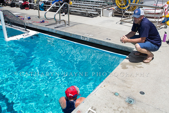 Sean Nolan speaks to a goalie during Championships at US Open Wa